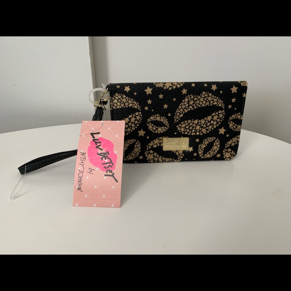 Betsey Johnson wristlet black and gold stars